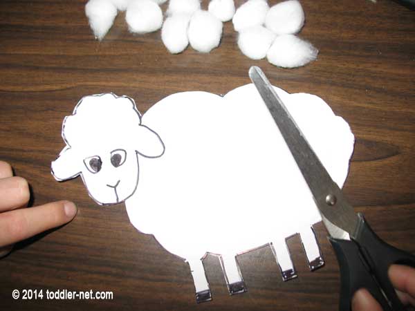 cutting out a sheep shape