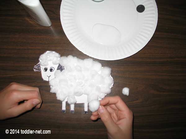 covering sheep cut out with cotton balls