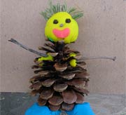 Playdough and pine cone snowman
